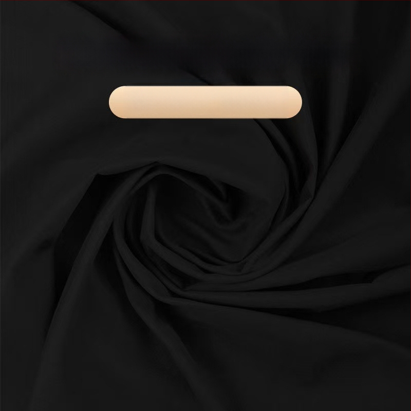 Prekės fotografijai fonas – šviesos sugeriantis audinys, flokotuotas velveto paviršius, medžiaga: audinys