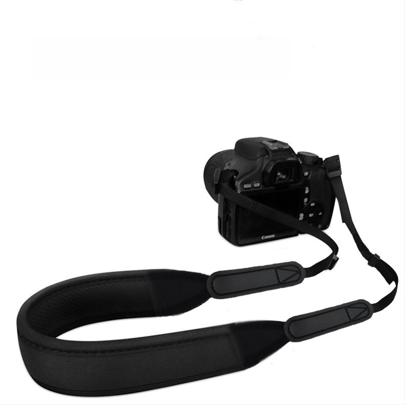 Kamera dirželis su greitu atleidimu, reguliuojamas ilgis, nardymo medžiaga, maksimalus apkrovimas 3 kg, suderinama su visomis kameromis