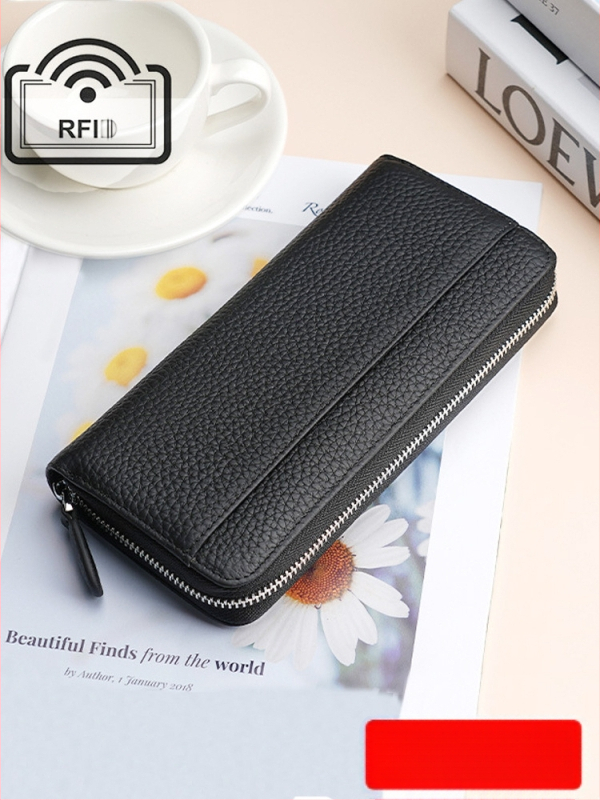 Naistele ehtne nahast pikk klutch-kott, tõmblukuga, vertikaalne ruudu kujuline siluett, kõrgekvaliteediline veiseloha nahk, tõmblukuga suletav, sisemised taskud telefonile ja dokumentidele