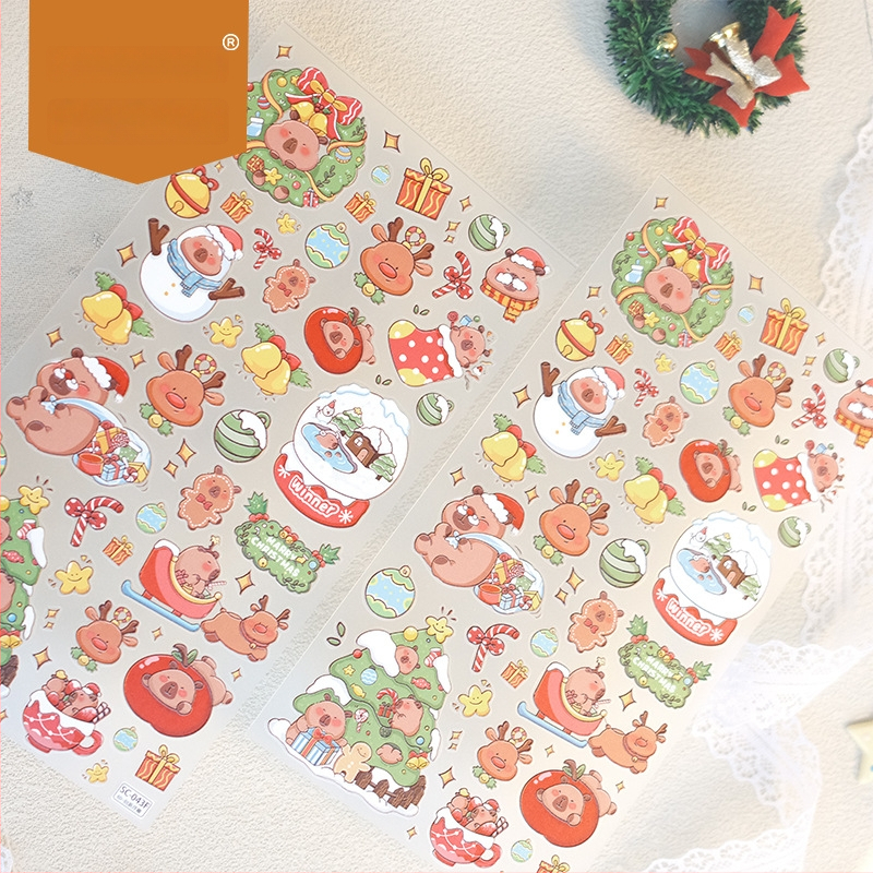 Reljefinis lipdukas mobiliajam telefonui: Kalėdinė kapibara, mielas stilius, universali suderinamumas