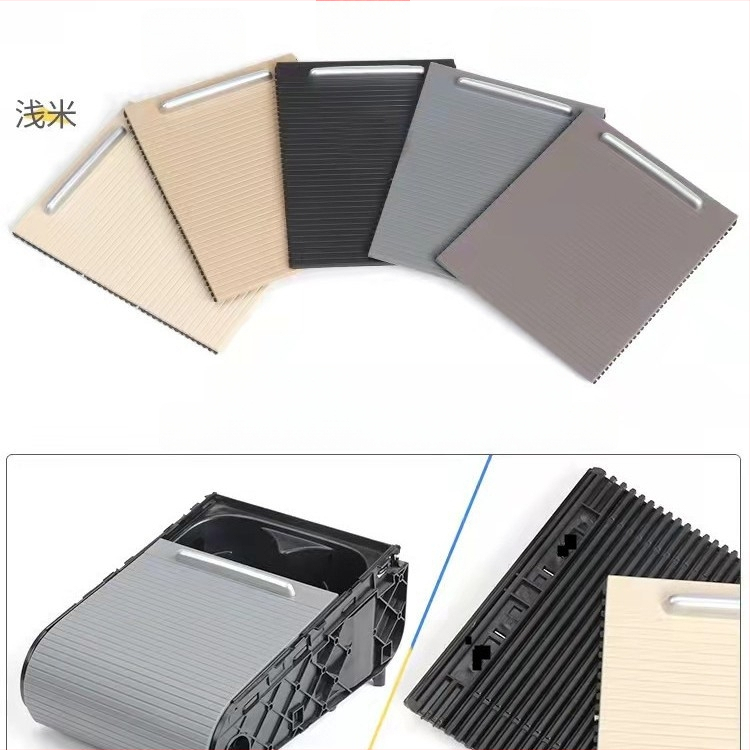 Kausa turētāja vāciņš centrālajai salona kastītei ar velkamu žalūziju — Modelis 3CD857503; Materiāls: ABS-PC + TPU; Pielāgojama