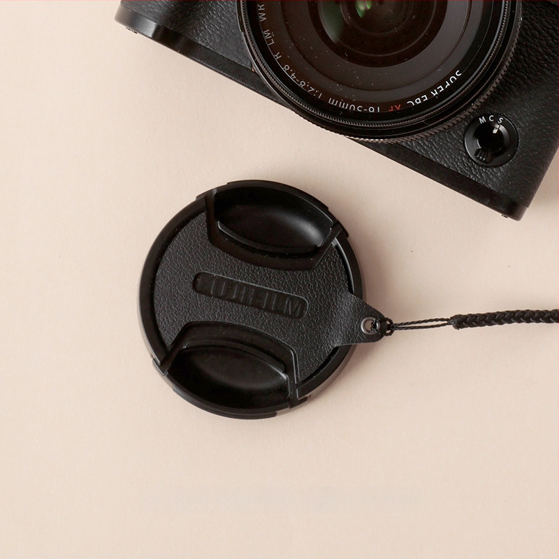 Objektyvo gaubtas odinis kilpinis trosas Sony – ETAU, OEM apdorojimas, pakuotė Opp bag, pradėtas 2023 m., po pardavimo: trijų garantijų