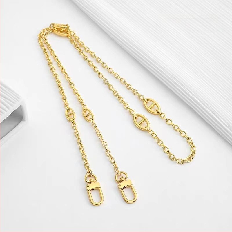 Ζώνη τσάντας/ώμου Yu Yi, μεταλλική, γεωμετρικό μοτίβο, εξουσιοδοτημένη ιδιωτική μάρκα, άνοιξη 2023.