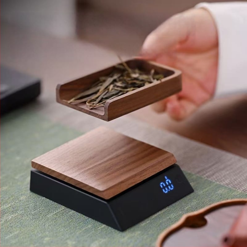 Diófa teás mérleg 0,1 g pontossággal, tartalmaz kis teáskanalat, modell JH-C30, teherbírás 2000 g, elektronikus mérés, beépített újratölthető akkumulátor