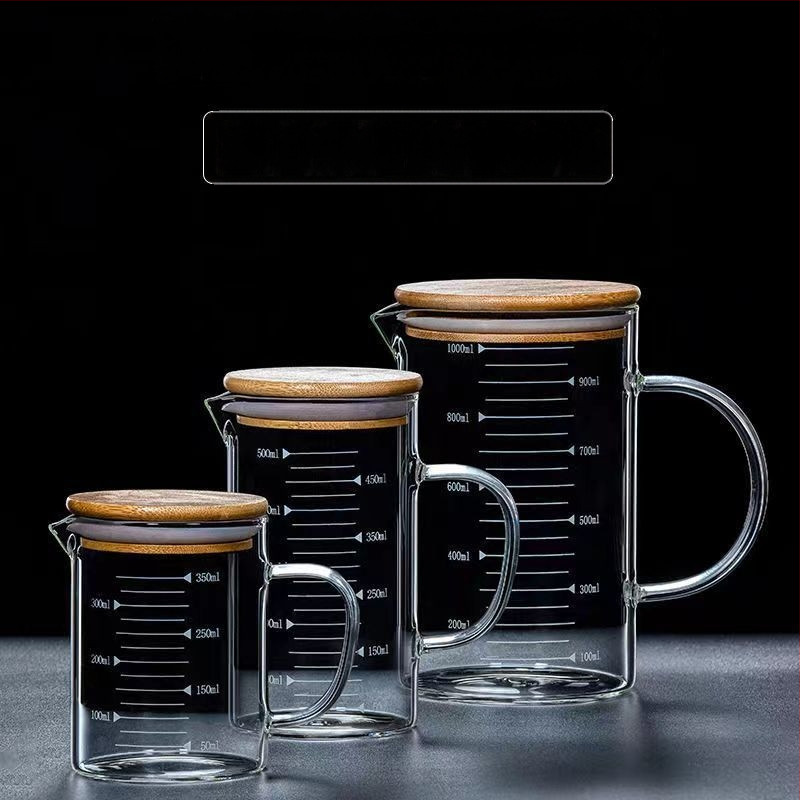 Hőálló üveg mérőedény skálával, fedéllel és fogantyúval