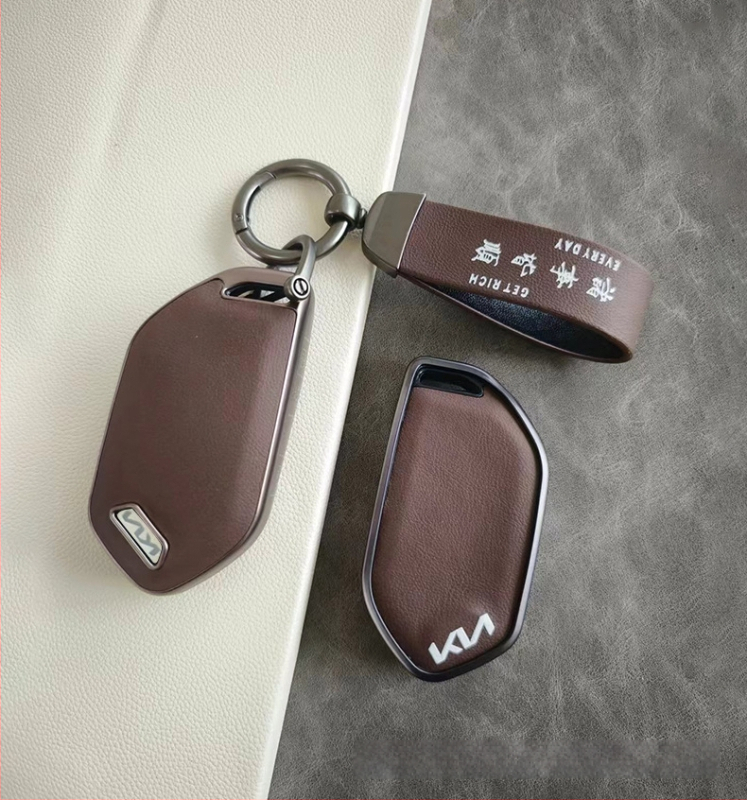Kia EV5 TPU atslēgu vāciņš ar ādas tekstūru un sprādze – vienkāršs stils