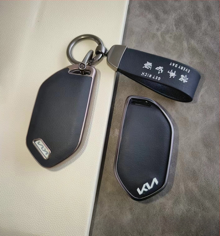 Kia EV5 TPU atslēgu vāciņš ar ādas tekstūru un sprādze – vienkāršs stils