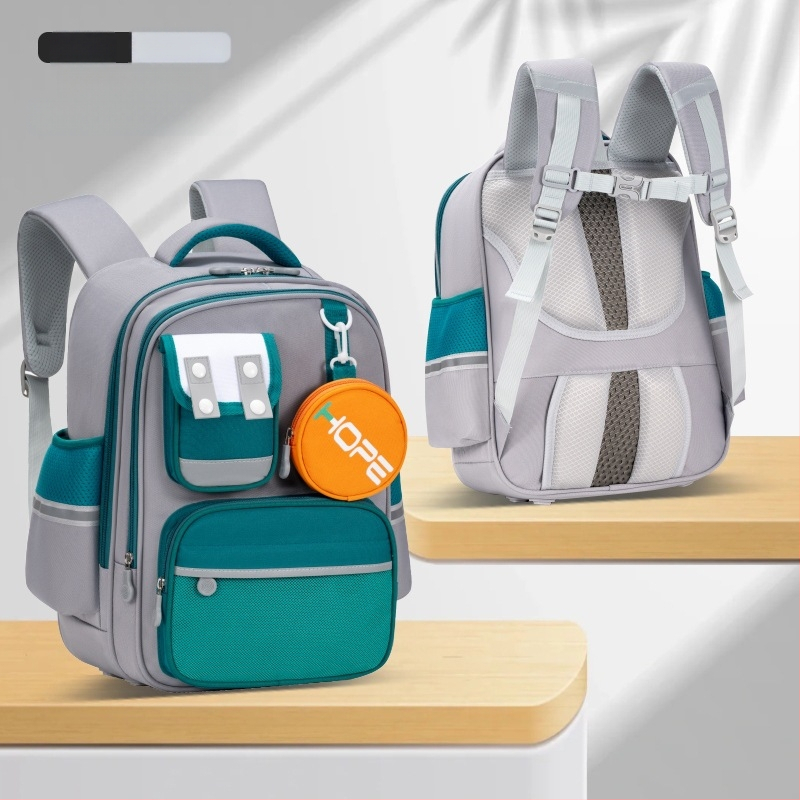 Unisex mokyklinė kuprinė 1–6 klasei, poliesterio medžiaga, didelė talpa su keliais skyrimis, pečių diržai su oro pagalve, jaunatviškas kampuso stilius