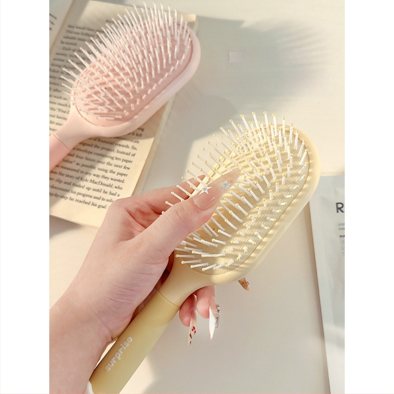 Pieptene portabil anti-static cu pernă de aer pentru păr creț la femei