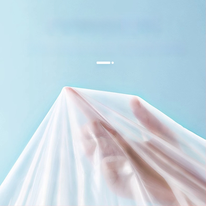 Vienkartinis lietaus pončas žygiams su PE audiniu, įprasto storio, 60–100 g, vienam asmeniui.