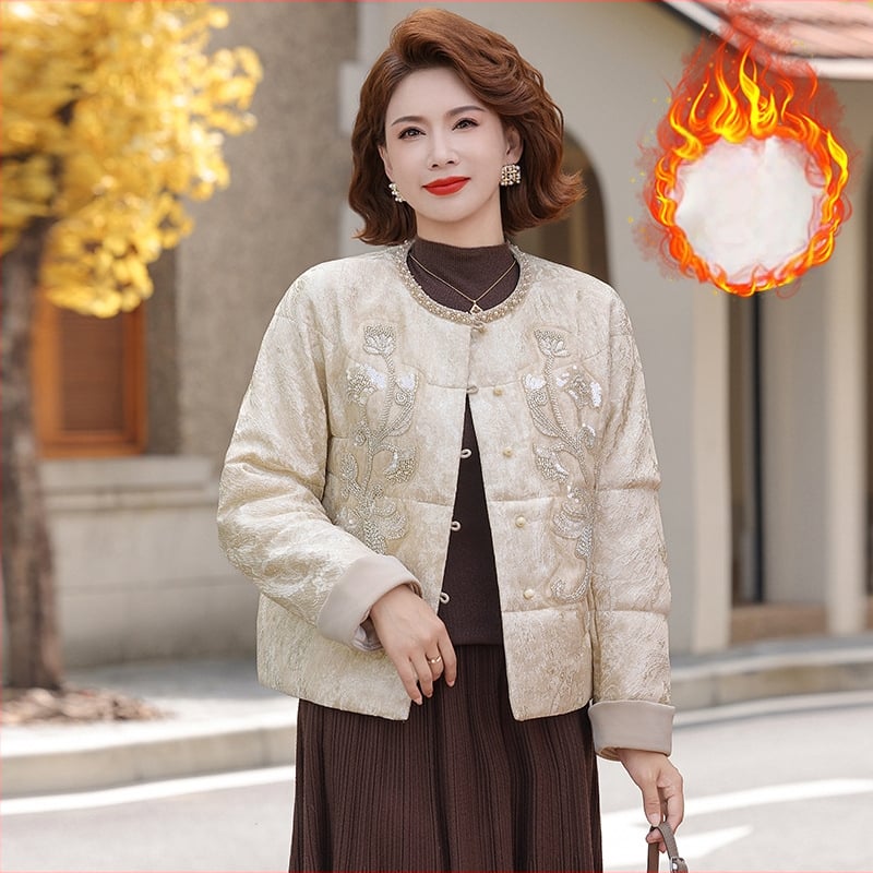 Jachetă scurtă de iarnă pentru femei, material principal poliester 95%+, umplutură din imitatie de mătase-cotton, glugă, model abstract, lungime medie 50–65 cm.