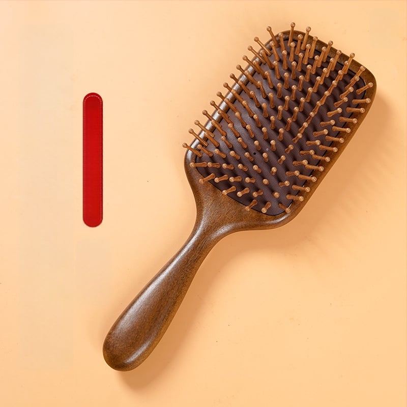 Szantálfa hajkefe légpárnás kialakítással, masszázsfunkcióval és gravírozott logóval