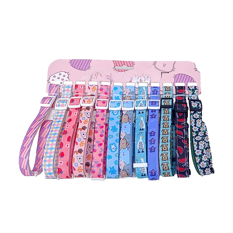 Augintinio harnasas ir pavadėlio rinkinys — karikatūrų raštas, austas audinys