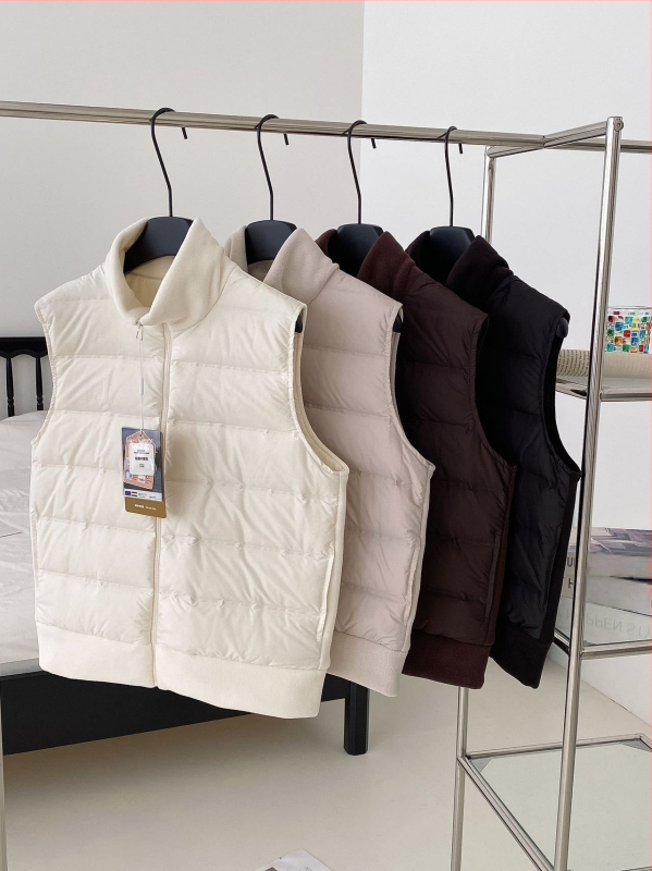 Ženski prsluk s perjem i fleece podstavnim okovom, zatvarač, poliester, debeli kroj, casual sportski stil, duljina 50–65 cm, jesen 2025
