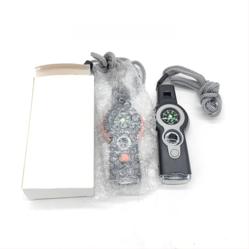 Túlélő eszköz LED-fénnyel, iránytűvel, sípolóval és hőmérővel (7 az 1-ben)