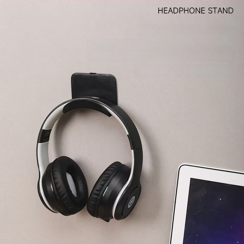 Ausinių laikiklis, universalus dizainas, plastmasinis korpusas (Tipas: Ausinių laikiklis; Medžiaga: Plastikas; Stilius: Universalus)