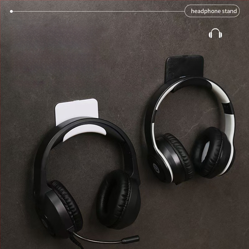 Ausinių laikiklis, universalus dizainas, plastmasinis korpusas (Tipas: Ausinių laikiklis; Medžiaga: Plastikas; Stilius: Universalus)