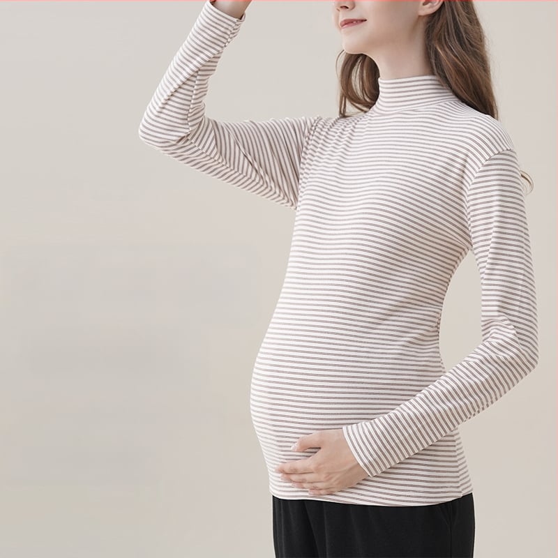 Nėštiesiems skirtas pagrindinis tops su gobtuvu, pusaukšto kaklo, ilgos rankovės, tiesus siluetas, vidutinio ilgio, poliesterio-elastano mišinys