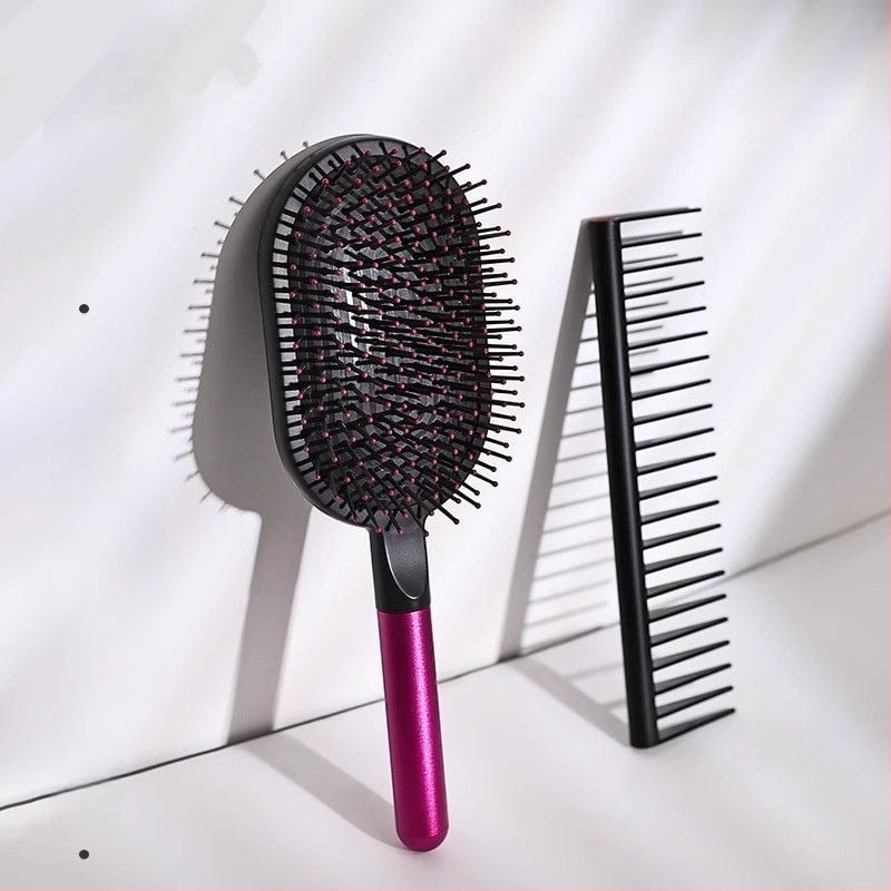 Plaukų šukos su oro pagalve ir masažu — ABS medžiaga; nėra importuota; kategorijos: plaukų šukos, garbanų šukos, oro pagalvės šukos