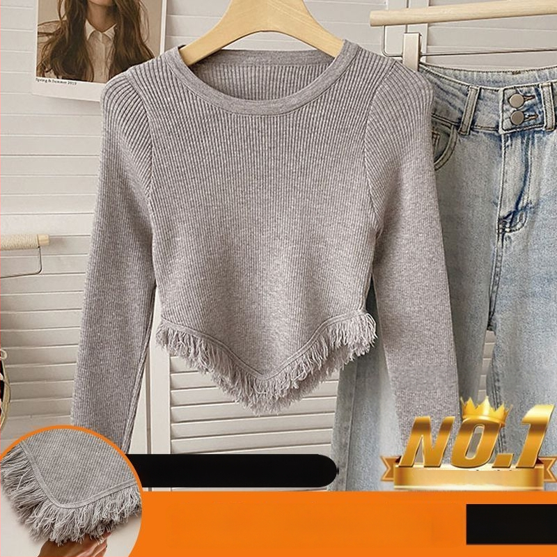 Ženski pleteni crop top s resicama, asimetričan rub, dugi rukav, okrugli izrez