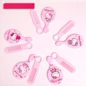 Lastele mõeldud porgandi kujuline kokkupandav kamm pikkadele juustele — kaasaskantav, kaheotstarbeline sirgestamiseks ja lokkide tekitamiseks