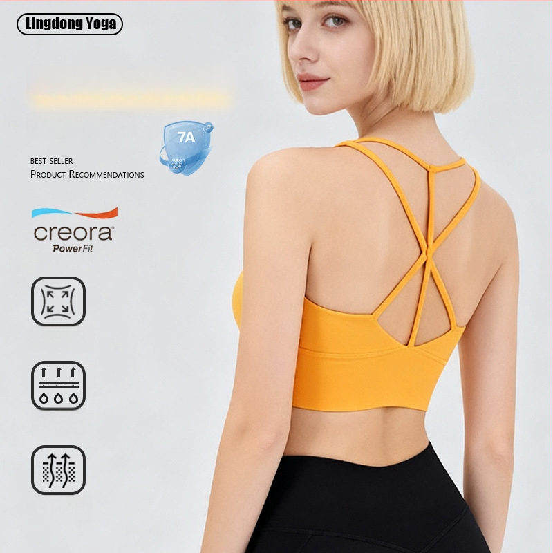 Moterų jogos ir pilates sportinė liemenėlė su krūties pagalvėlėmis, drėgmę šalinantis audinys, nailonas 75%/spandeksas 25%, siauras kirpimas, liemens ilgis, rudens leidimas 2025