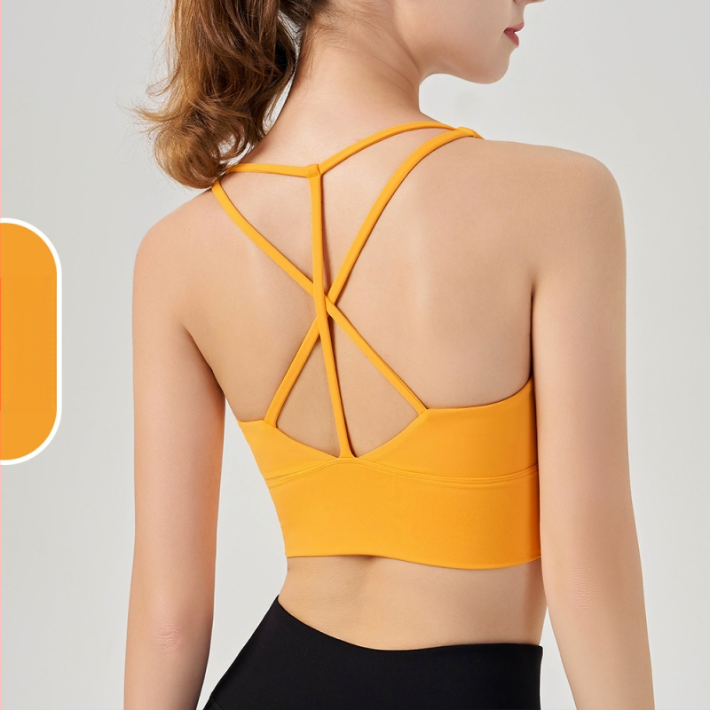 Moterų jogos ir pilates sportinė liemenėlė su krūties pagalvėlėmis, drėgmę šalinantis audinys, nailonas 75%/spandeksas 25%, siauras kirpimas, liemens ilgis, rudens leidimas 2025