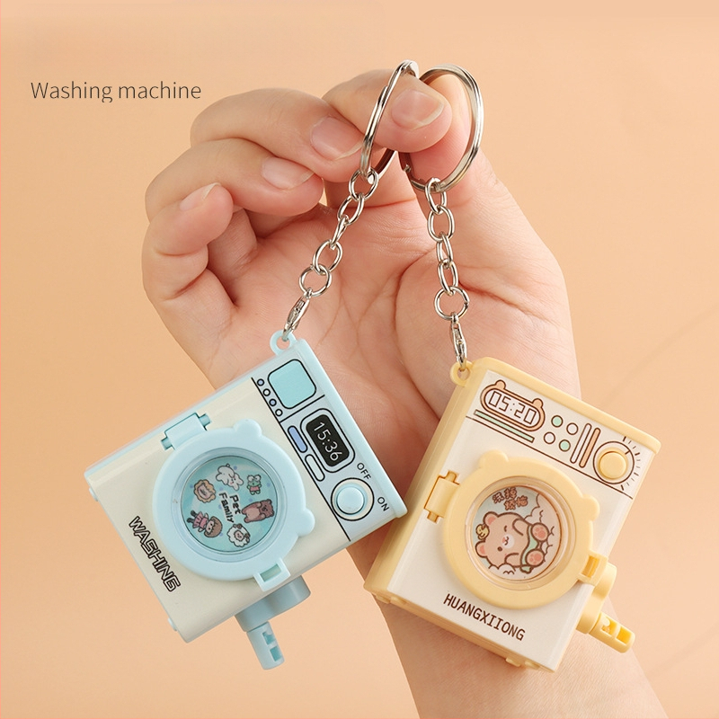 Atslēgu gredzens ar karikatūras veidolu veļasmaiņā, spīdīga plastmasas rotaļlieta, attīsta satvērienu un roku- acs koordināciju, bērniem vecumā 4–6 gadi