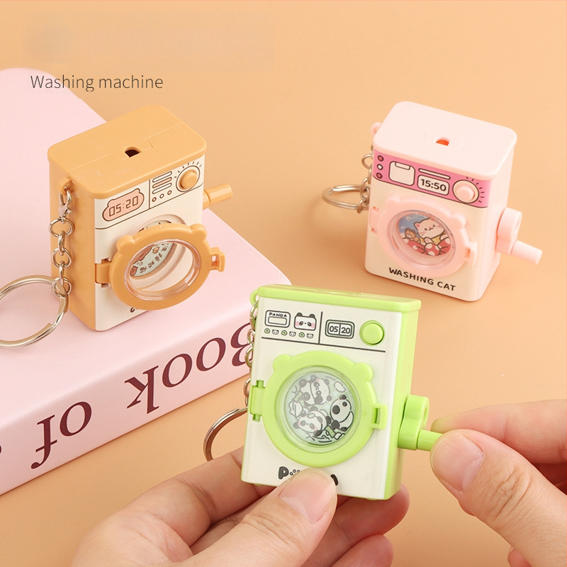 Atslēgu gredzens ar karikatūras veidolu veļasmaiņā, spīdīga plastmasas rotaļlieta, attīsta satvērienu un roku- acs koordināciju, bērniem vecumā 4–6 gadi