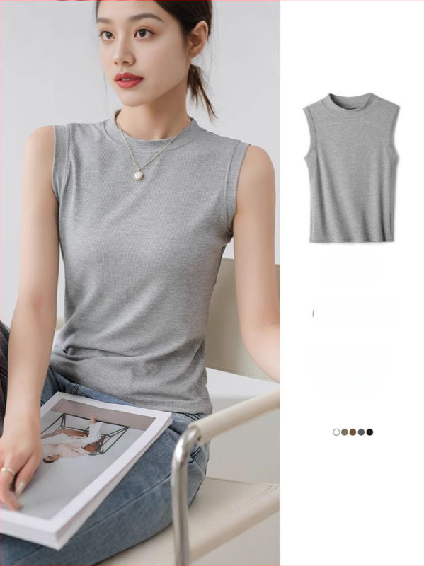 Pamučna kamizola, uska silueta, prugasti ili karirani uzorak, duljina 50–65 cm, ljeto 2025