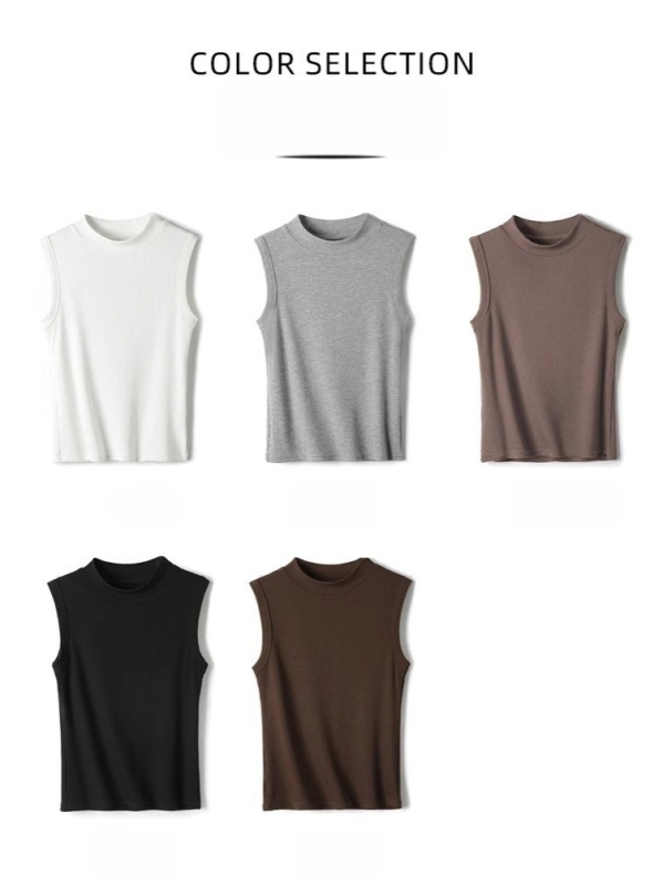 Pamučna kamizola, uska silueta, prugasti ili karirani uzorak, duljina 50–65 cm, ljeto 2025