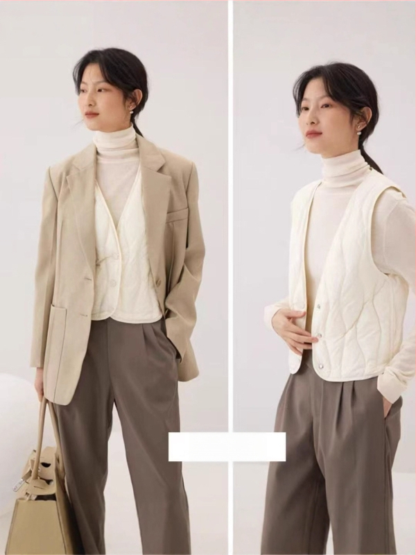 Ženski prsluk od najlona s vanjskim slojem, uski kroj, sadržaj down 86–90%, punjenje od bijelog pačjeg downa, prednja s tri gumba