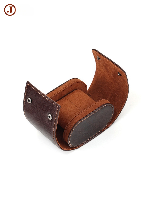 Tõelist lehmakarva nahast kellade hoiukarp, käsitöö, kaasaskantav reisile; tolmukindel ja vibratsioonikindel. Pakendamise kogus: 1 tk; Päritolu: Guangzhou; Trükitud LOGO: Jah; Kohandamine: Jah; Licentsiseeritav privaatmärk: Jah.