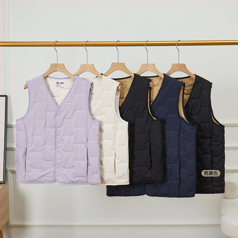 Sieviešu veste ar aitas vilnas pildījumu un poliestera galveno audumu 95%+, V formas kakla atvērums, vidēja garuma, šaurs piegriezums