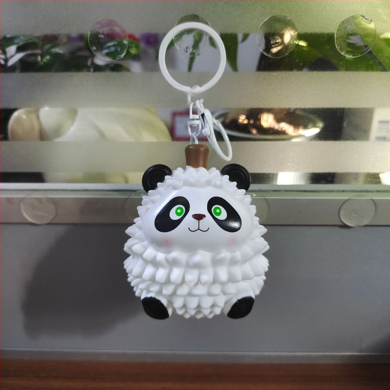 Gaismas atslēgu piekariņš ar panda-durian figūru, patīkama augļu sērija, materiāls viskoze, iepakojums OPP maisiņā, piemērots vecuma diapazonam 15–35 gadi
