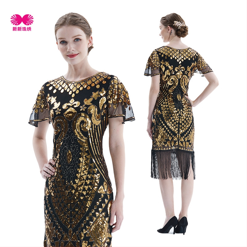 Рокля в стил Гатсби с мънисти и мрежест тъкан, къс ръкав, дълбоко V-деколте, пайети и ресни; полиестер/найлон смес, основна тъкан 50–70%, средна дължина на пола