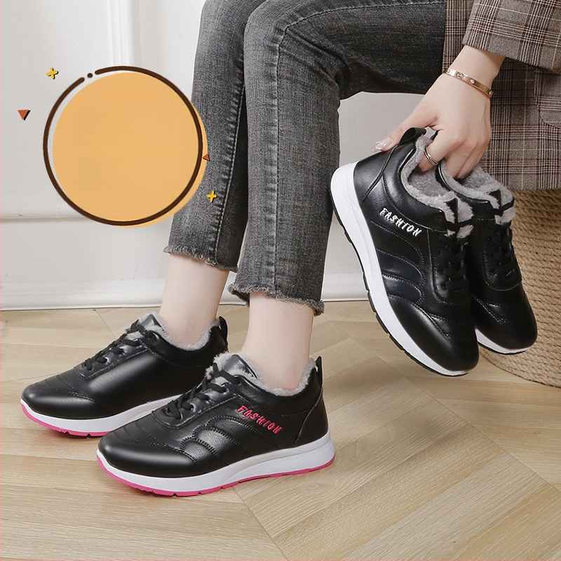 Sieviešu sporta apavi ar ādas augšdaļu un kažokādas iekšējo odai, apaļa purngala, zems papēdis 1–3 cm, šņorējami, injekcijas veidota zole