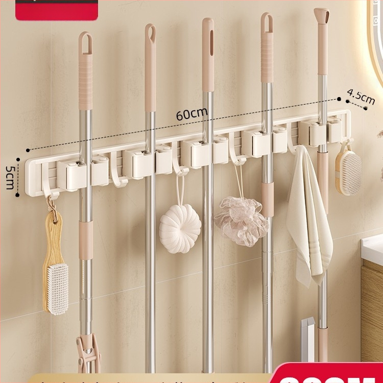 Stienā sienas plaukts mopam un slotai Crown Toon, materiāls: kosmiskais alumīnijs un plastmasa, uzstādīšana bez urbumiem, uzglabāšana mopas rokturiem, virsmas apdare: spreja plastmasa, svars 0,3 kg