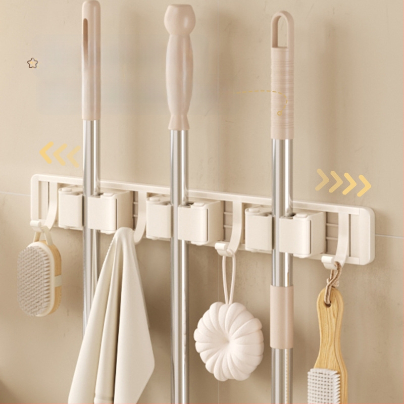 Stienā sienas plaukts mopam un slotai Crown Toon, materiāls: kosmiskais alumīnijs un plastmasa, uzstādīšana bez urbumiem, uzglabāšana mopas rokturiem, virsmas apdare: spreja plastmasa, svars 0,3 kg