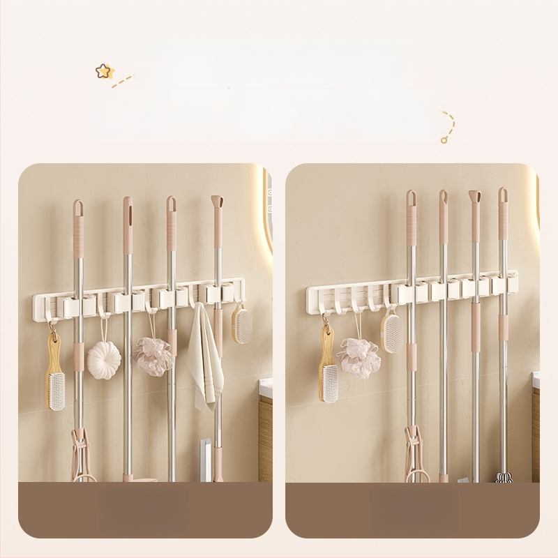 Stienā sienas plaukts mopam un slotai Crown Toon, materiāls: kosmiskais alumīnijs un plastmasa, uzstādīšana bez urbumiem, uzglabāšana mopas rokturiem, virsmas apdare: spreja plastmasa, svars 0,3 kg