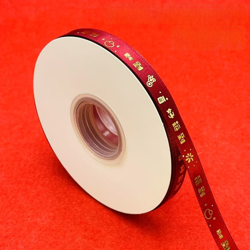 Dekoratyvinė dovanos juosta su auksiniu karšto įspaudimo elementu — dekoratyvinė juosta dovanoms (auksinis karšto įspaudimo; dekoratyvinė juosta; tinkama dovanojimo pakavimui)