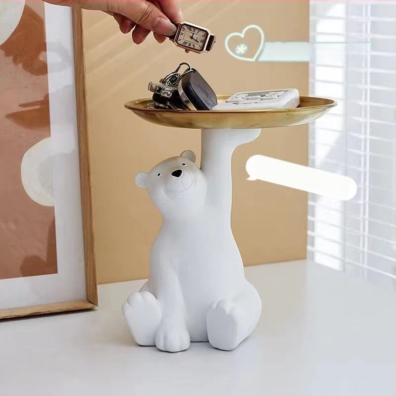 Nordiskā stila atslēgu uzglabāšanas dekors ar polārās lāča motīvu ieejai un viesistabai