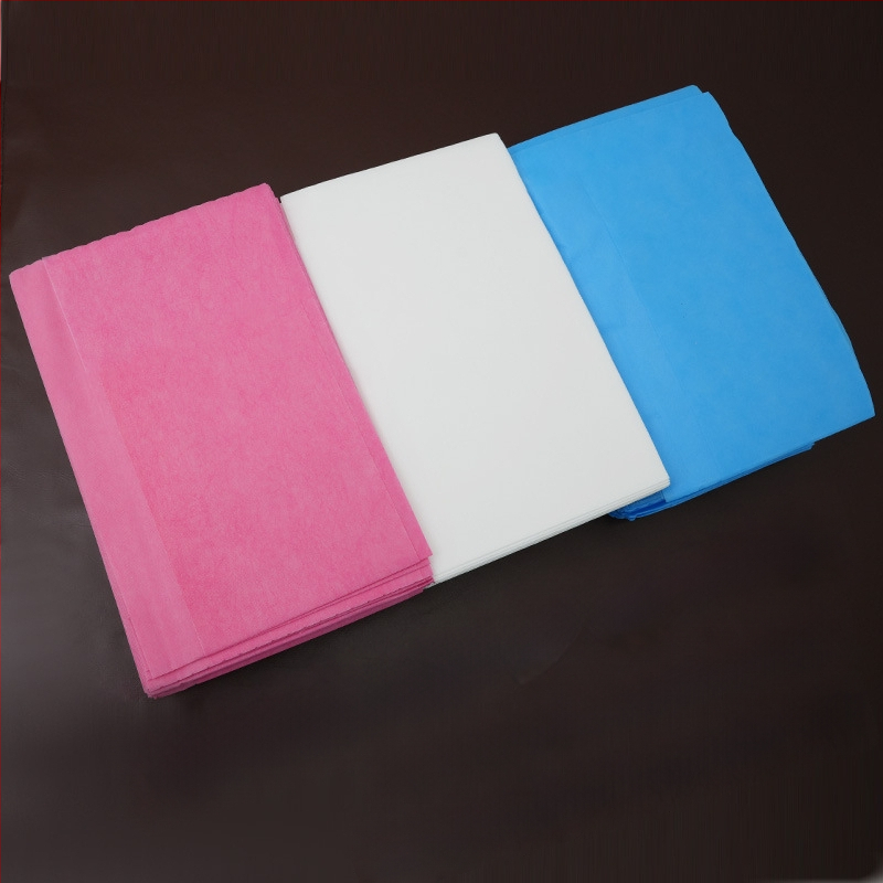 Vienreizējās lietošanas biezas ūdensizturīgas neaustas dvieļi manikīram un pedikīram, salona spilventiņi masāžai, 100 lapas iepakojumā