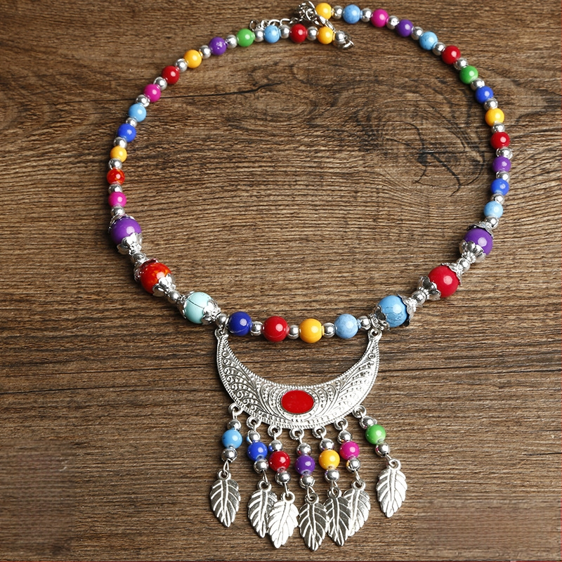 Etno stiiliga kaelakee lillekujundusega; materjalid: kangas ja segamaterjalid; bränd: Confucianism and Yixiang; päritolu: Yunnan