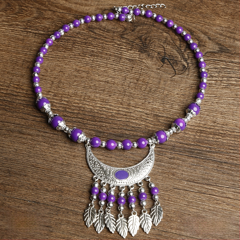 Etno stiiliga kaelakee lillekujundusega; materjalid: kangas ja segamaterjalid; bränd: Confucianism and Yixiang; päritolu: Yunnan