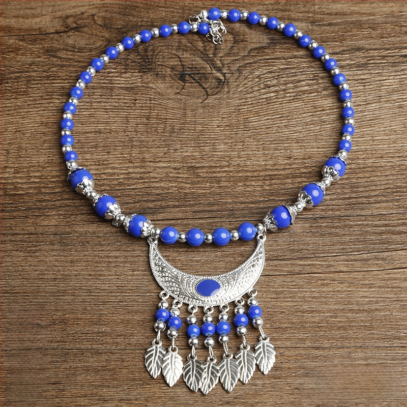 Etno stiiliga kaelakee lillekujundusega; materjalid: kangas ja segamaterjalid; bränd: Confucianism and Yixiang; päritolu: Yunnan