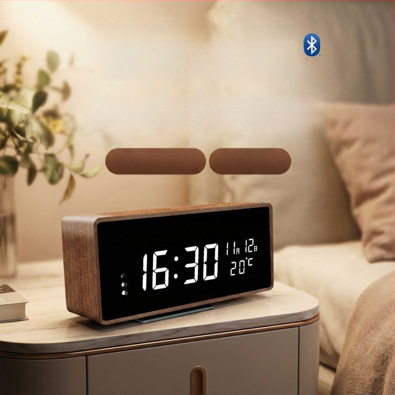 Mormon äratuskell, tammest korpus, LED-numbriline display, akudega toidetav elektrooniline liikumine, termomeeter ja nädalapäeva kuvamine