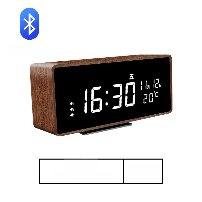 Mormon äratuskell, tammest korpus, LED-numbriline display, akudega toidetav elektrooniline liikumine, termomeeter ja nädalapäeva kuvamine