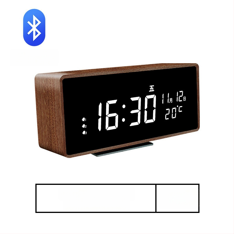Mormon äratuskell, tammest korpus, LED-numbriline display, akudega toidetav elektrooniline liikumine, termomeeter ja nädalapäeva kuvamine