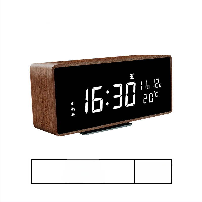 Mormon äratuskell, tammest korpus, LED-numbriline display, akudega toidetav elektrooniline liikumine, termomeeter ja nädalapäeva kuvamine